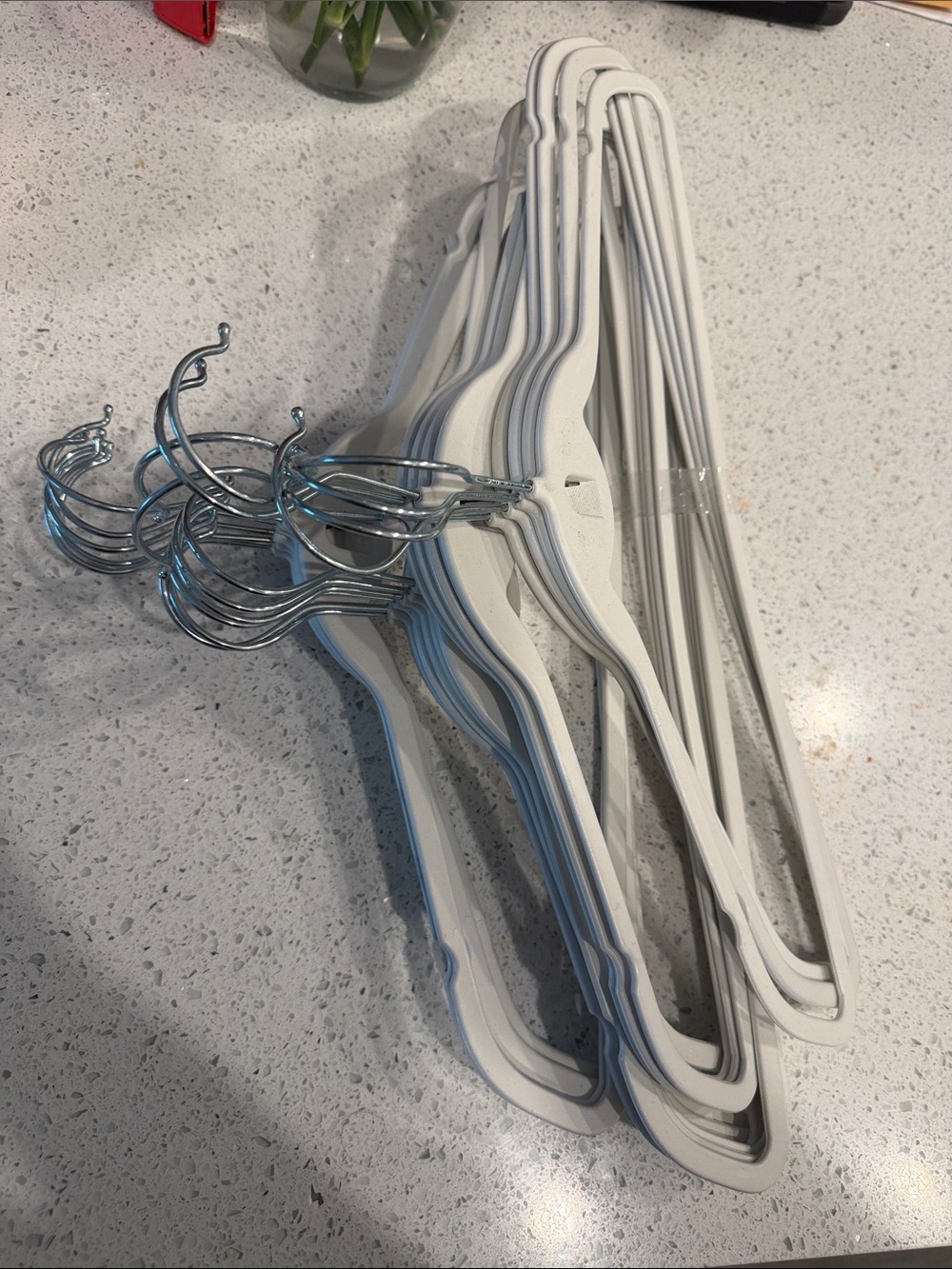 Set of White Plastic & Chrome Metal Hangers